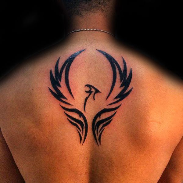 Upper back raised wings tribal phoenix tattoo for men