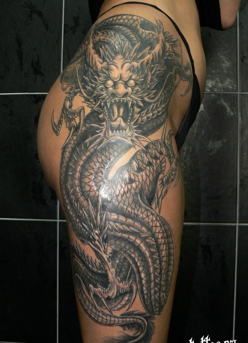 Black Chinese full dragon tattoo on waist to right leg