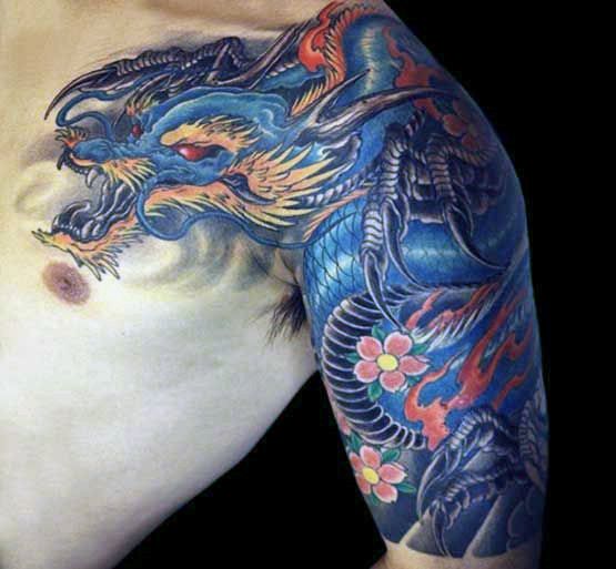 Chinese blue dragon tattoo with flowers on left shoulder and arm for men
