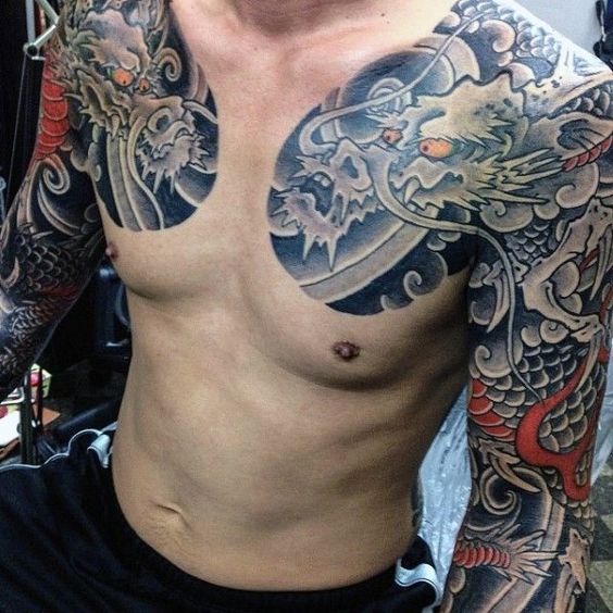 Chinese dragon tattoo on chest of men