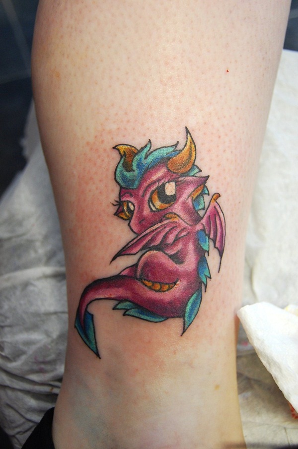 colorful baby dragon tattoo on lower leg