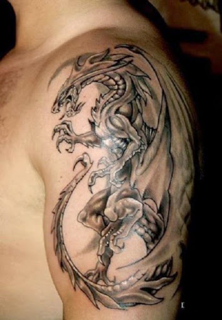 Full side dragon tattoo with wings and tail on shoulders to half-left arm