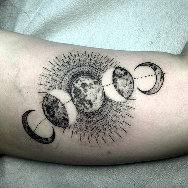 Black and grey 3d lunar cycle moon tattoo on upper arm