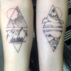 Black autumn inverted triangles full moon tattoo on inner arm