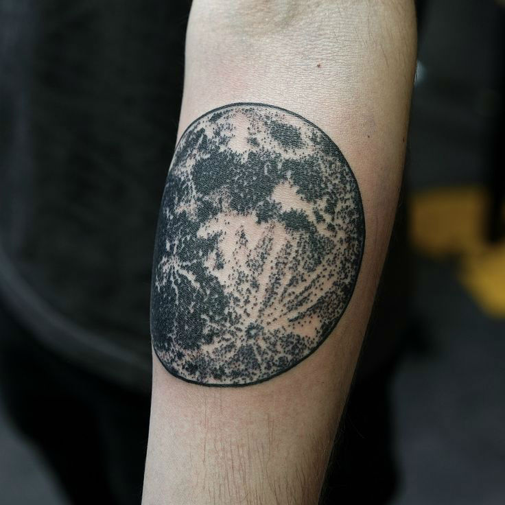 Black shaded 3d moon tattoo on inner arm