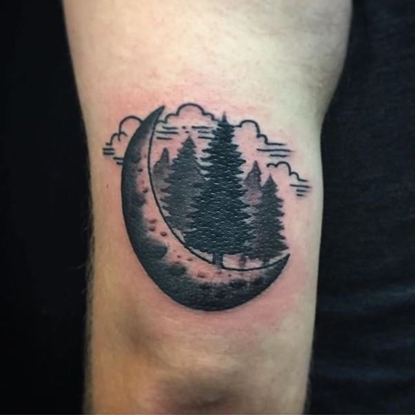 Black shaded half moon and trees tattoo on body