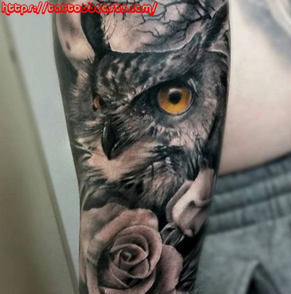 Black & white ink roses and owl tattoo on forearm