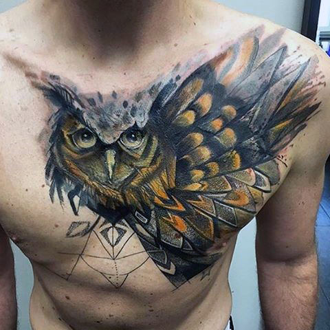 Colored realistic owl chest tattoo for men