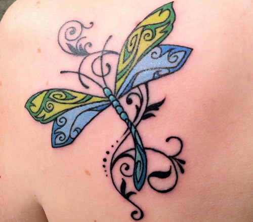 Colorful dragonfly tattoo design on left upper back
