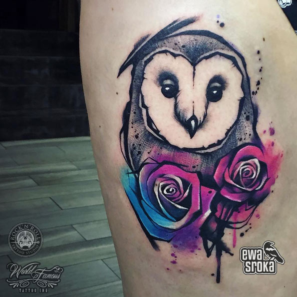 Grey ink barn owl with colorful roses tattoo on siderib