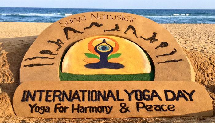 International Yoga Day yoga for harmony and peace sand art