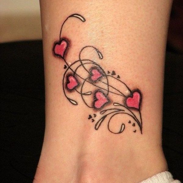 Red and black heart flower tattoo on lower right leg for women