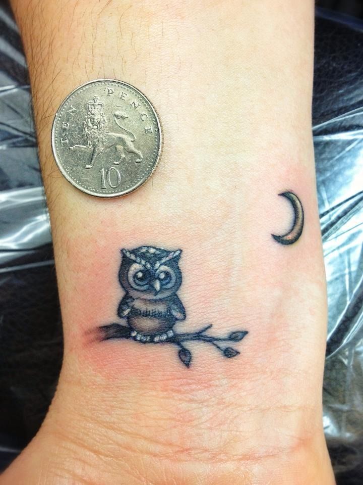 Small cute baby owl tattoo on wrist