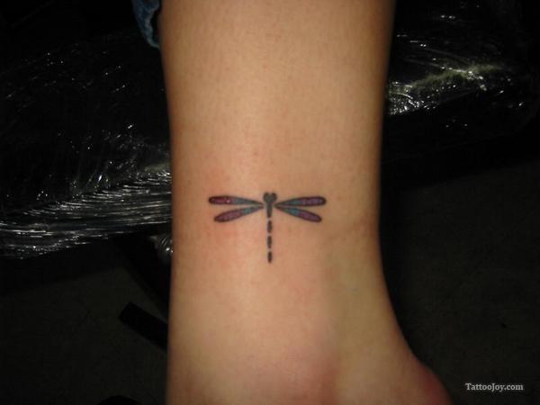 Small cute dragonfly ankle tattoo