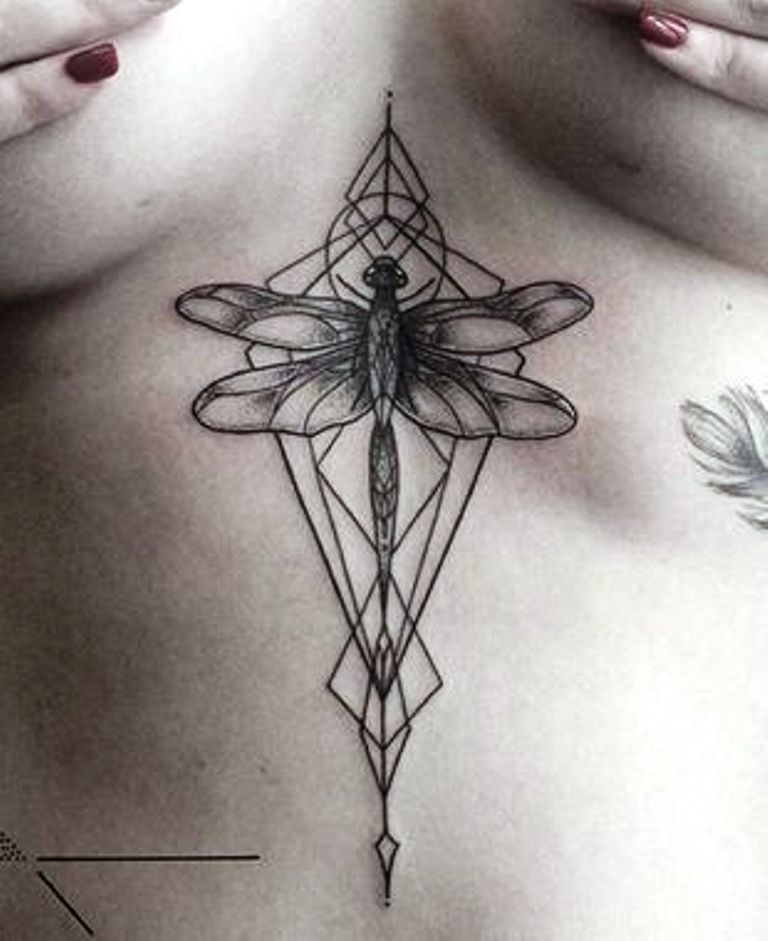 Wonderful geometric dragonfly tattoo below girl’s breast