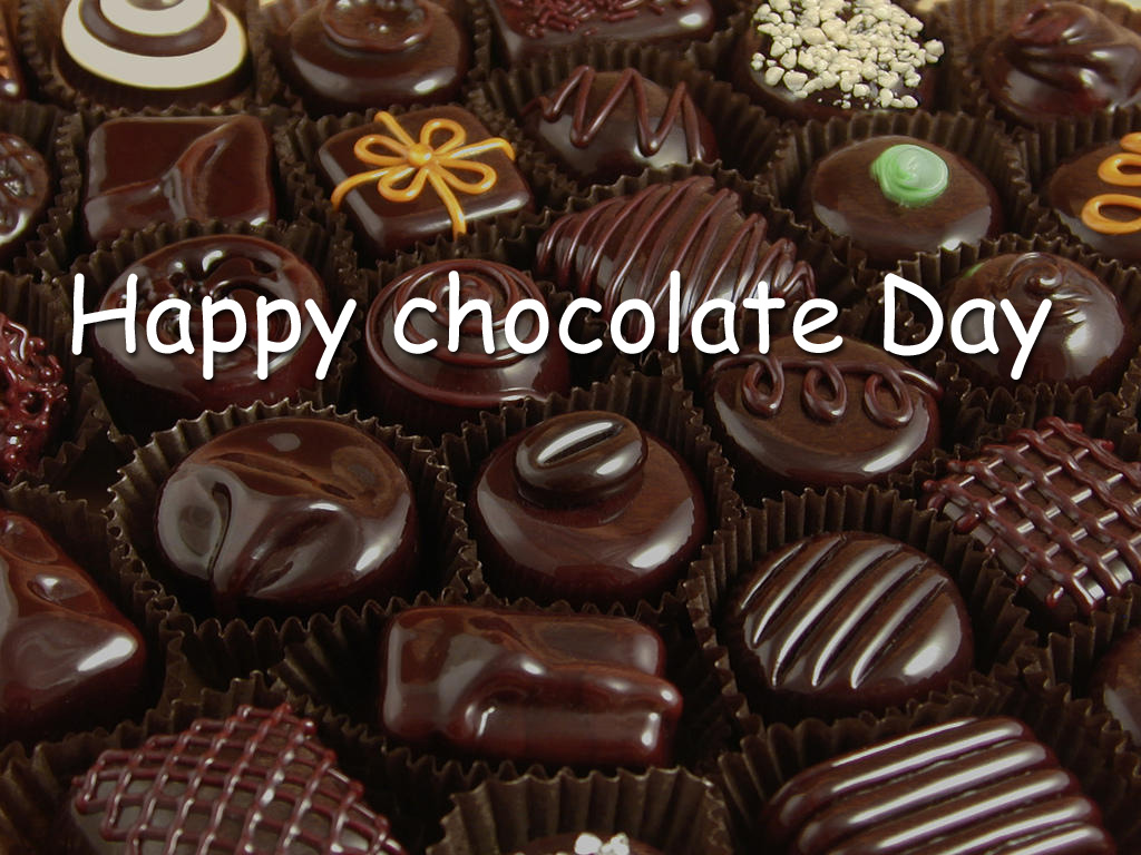 happy Chocolate Day yummy chocolates in background