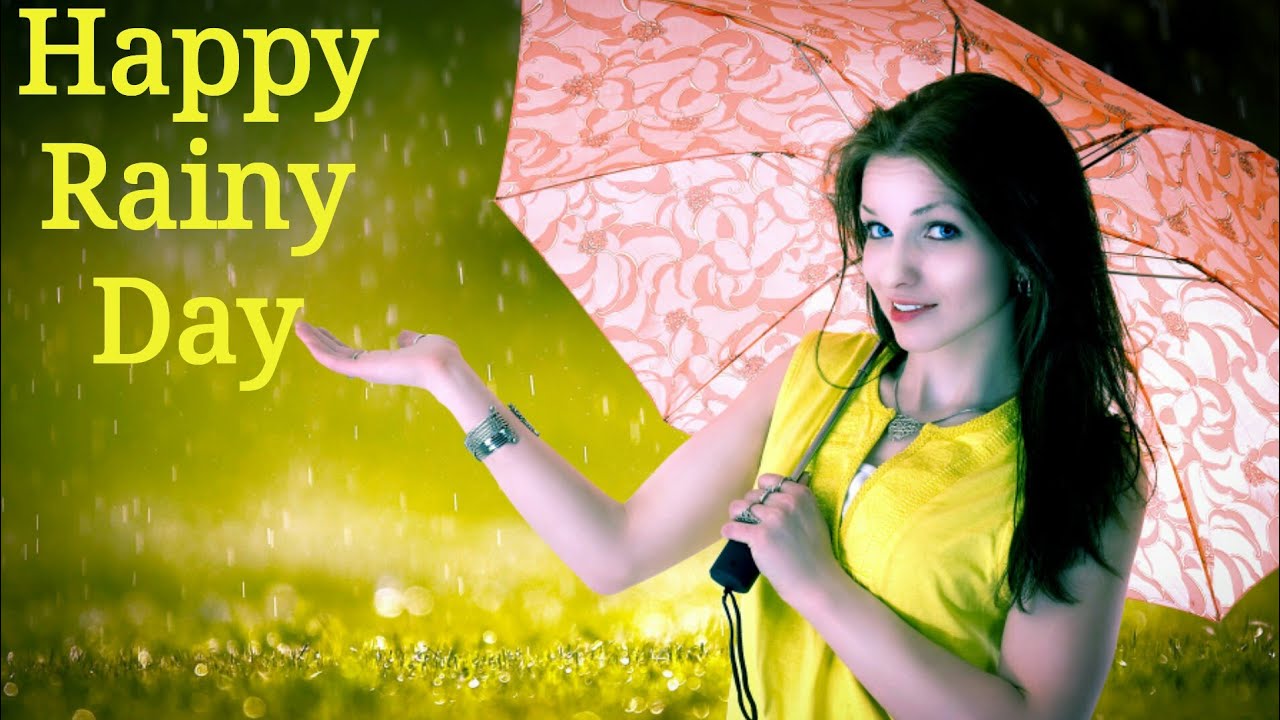 happy rainy day girl with umbrella during rain