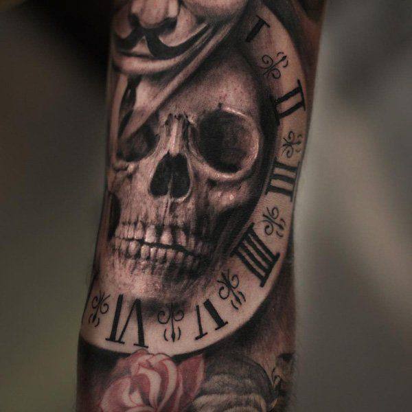 3D Skull and clock tattoo on men’s arm
