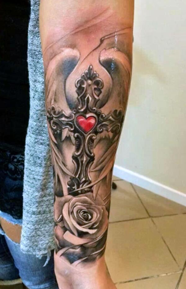 3D realistic rose and winged cross tattoo on forearm