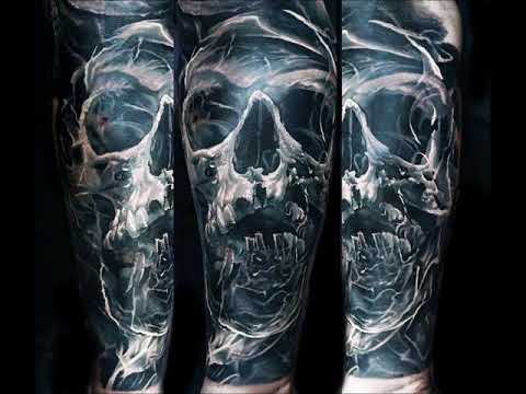 Black and grey skull tattoos on lower inner sleeves
