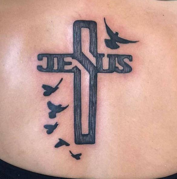 Black cross with birds Jesus message tattoo on back