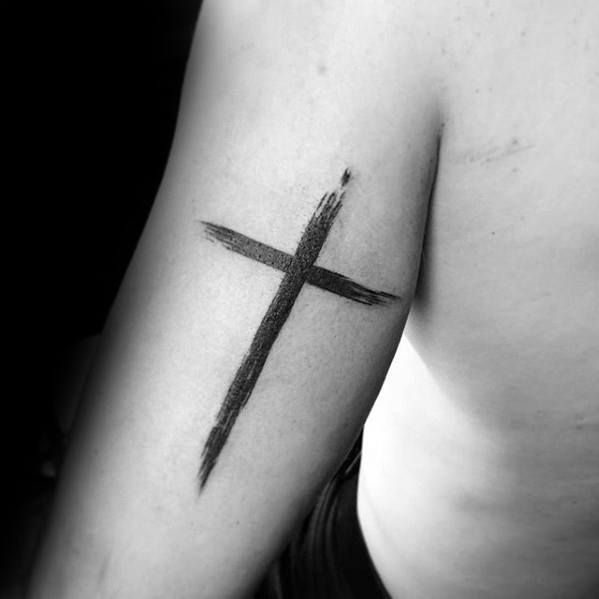 Black plain cross tattoo on upper back arm