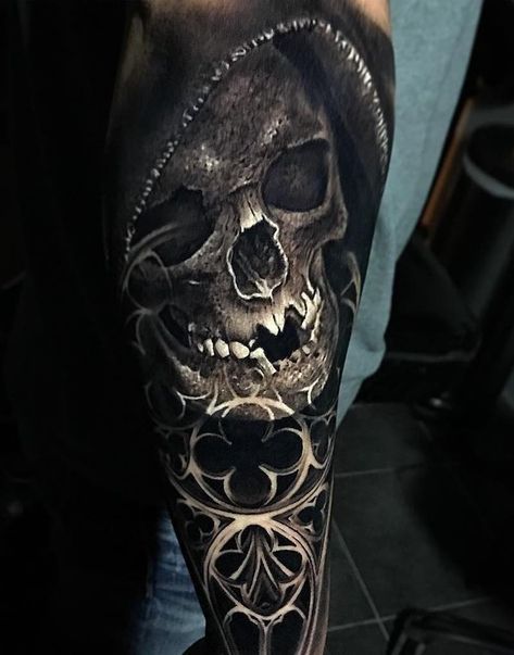 Black shaded Grim Reaper tattoo on body