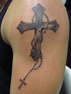 Black shaded cross with rosary tattoo on shoulder