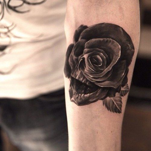 Black shaded skull on rose tattoo for women