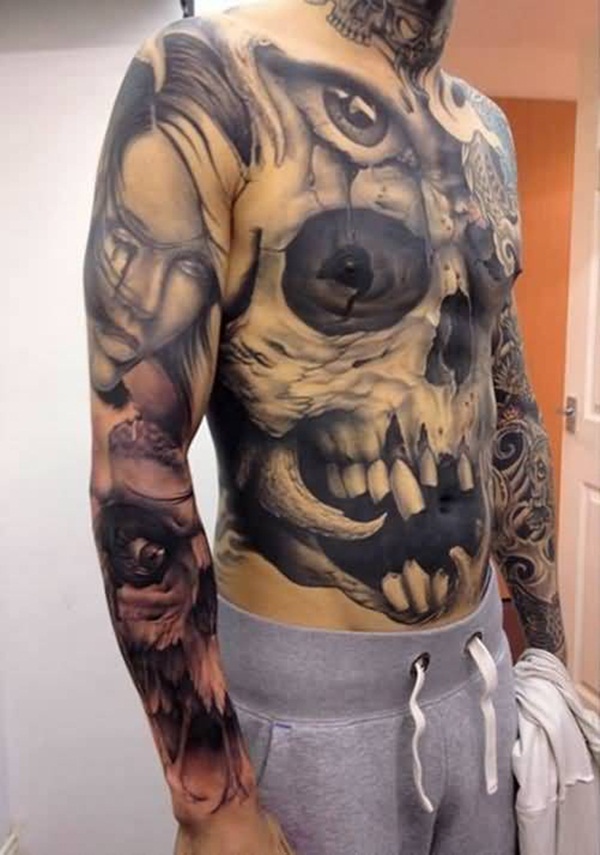 Black shaded skull tattoo on full chest for men