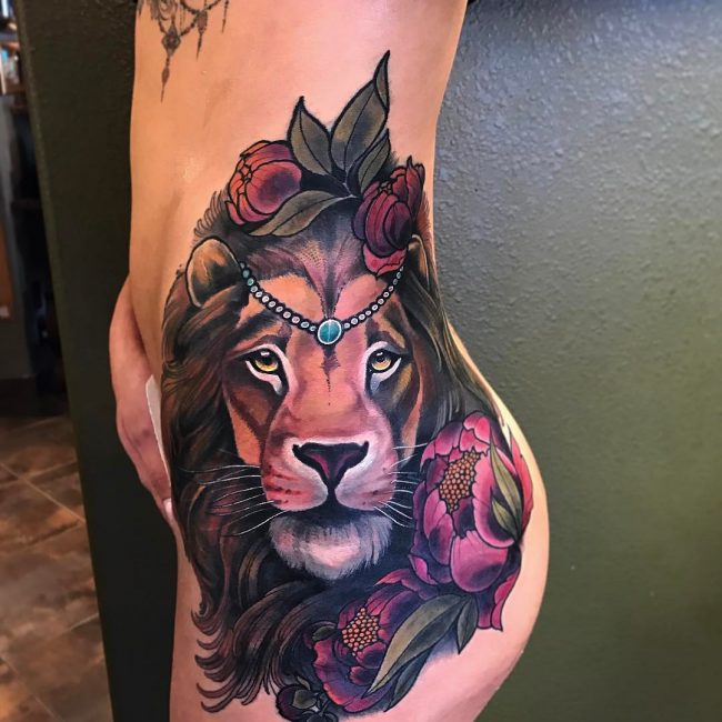 Colorful feminine lion flower tattoo on left body for women