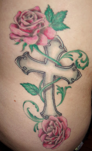 Grey cross with roses tattoo on body for women