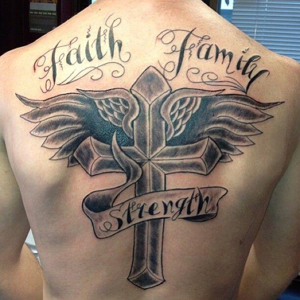 Grey shaded cross wings with message tattoo on back