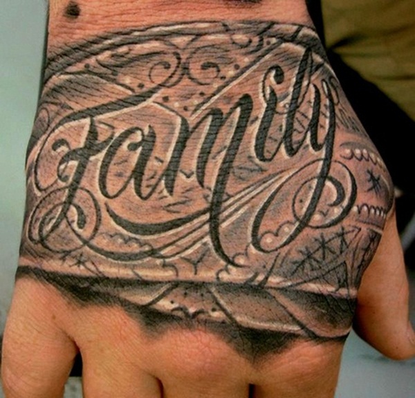 Black and grey shaded family tattoo on upper hand
