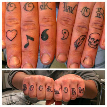 Black book worm transformations tattoo on upper fingers