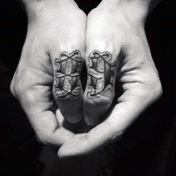 Black creative simple number tattoo on thumbs