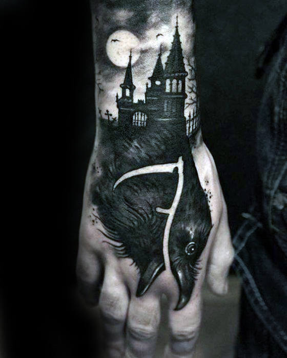 Black crow with castle tattoo on right hand