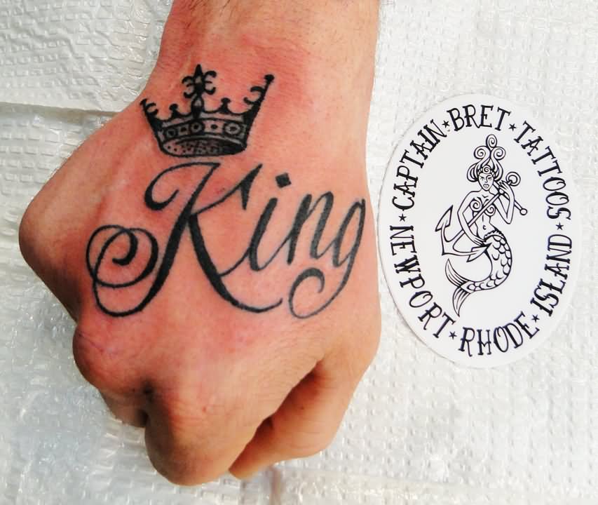 Black king crown tattoo on upper hand by Captainbret