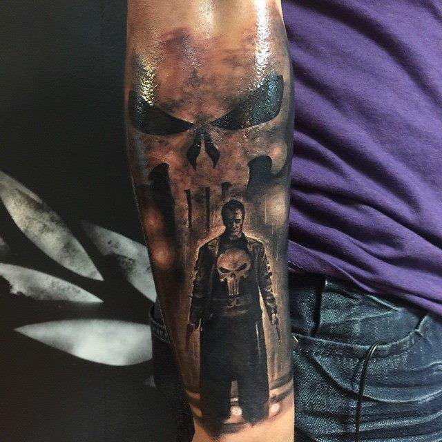 Black shaded punisher skull and man tattoo on forearm