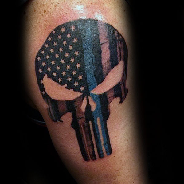 Blue lined american flag punisher tattoo on arm for men