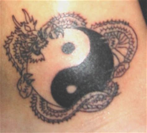 Black Yin Yang Dragon snake tattoo