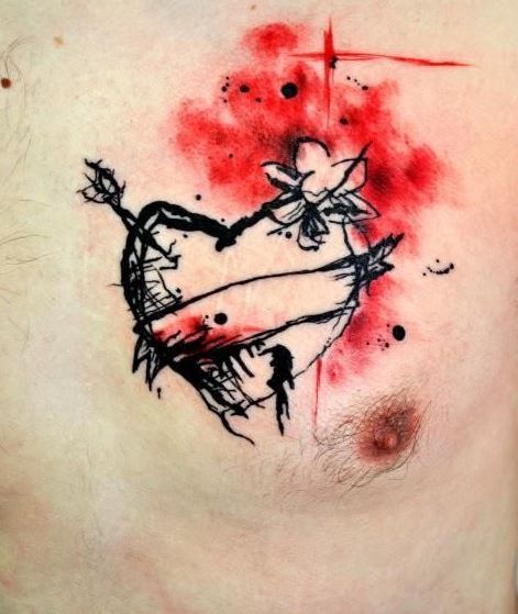 Black and red broken heart tattoo on chest for men