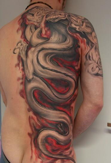 Black and red Chinese dragon and snake tattoo on right full back and arm