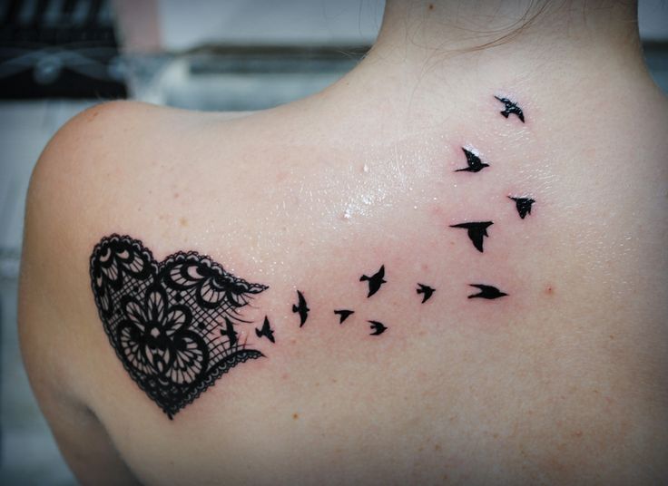 Black birds and broken from side heart tattoo design on upper left back for women