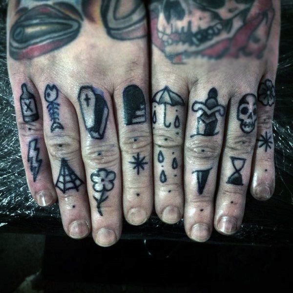 Black elements knuckle tattoo