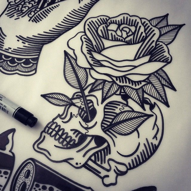 Black traditional skull with rose tattoo design