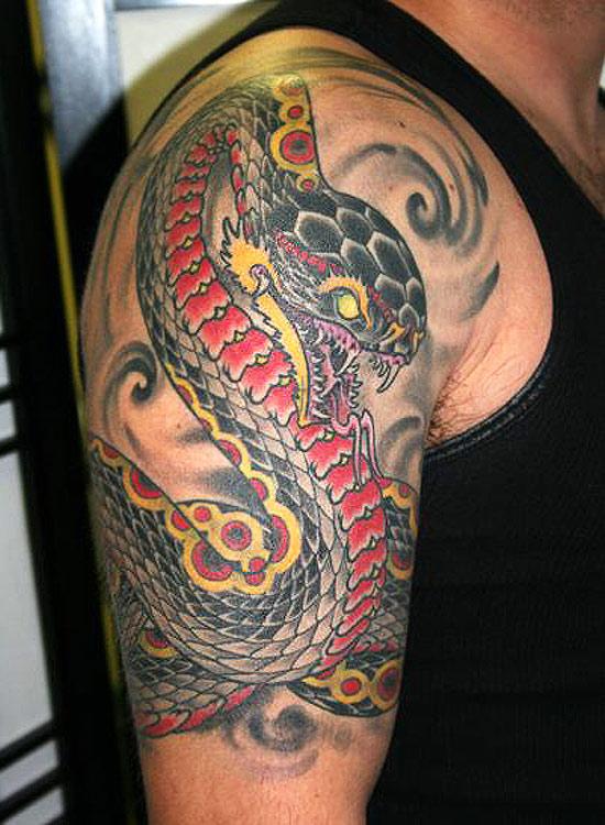 Colored Dragon snake tattoo on upper right arm