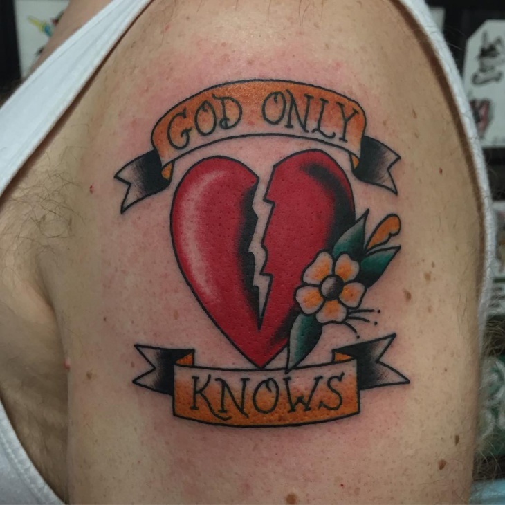 Colored broken heart tattoo on left hand for men