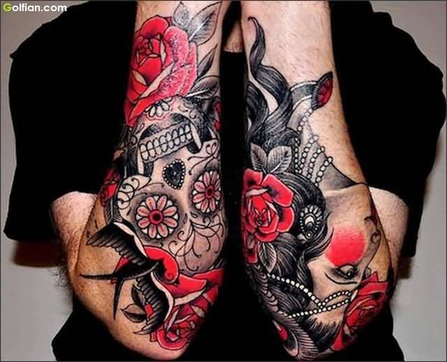 Colored rose sugar skull tattoo on forearms for women