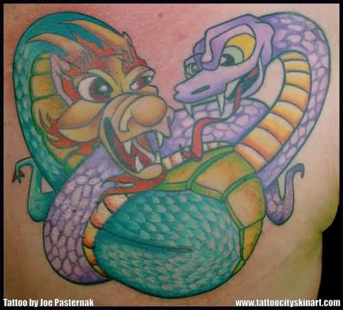 Green and purple Dragon and snake tattoo on body by Joe Pasternak